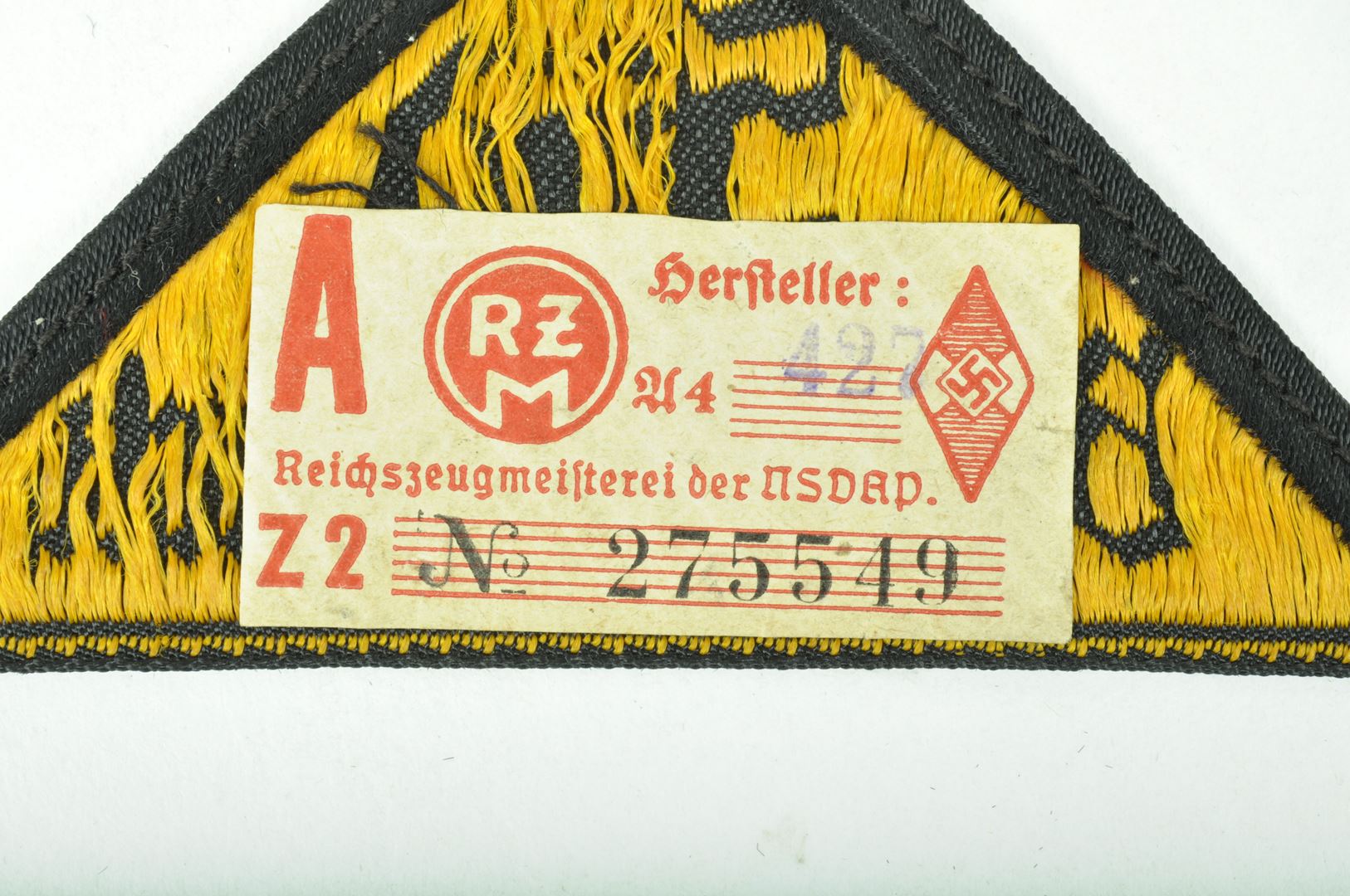 Triangle de bras HJ avec étiquette RZM /  "Süd Bayr. Ostmark"